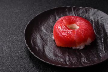 Donut shaped sushi rolls with salmon, shrimp and tuna