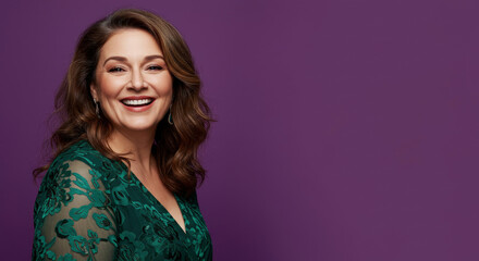 Obraz premium Mature woman happy on purple background