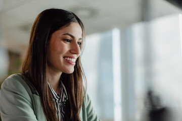 Fototapeta premium Professional Businesswoman Smiling in a Modern Office Setting