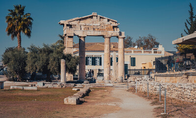 Fototapeta premium The most famous architectural landmarks of ancient greek heritage located in the Plaka district in Athens, Greece: the library of Hadrian, Wind tower, medieval mosque