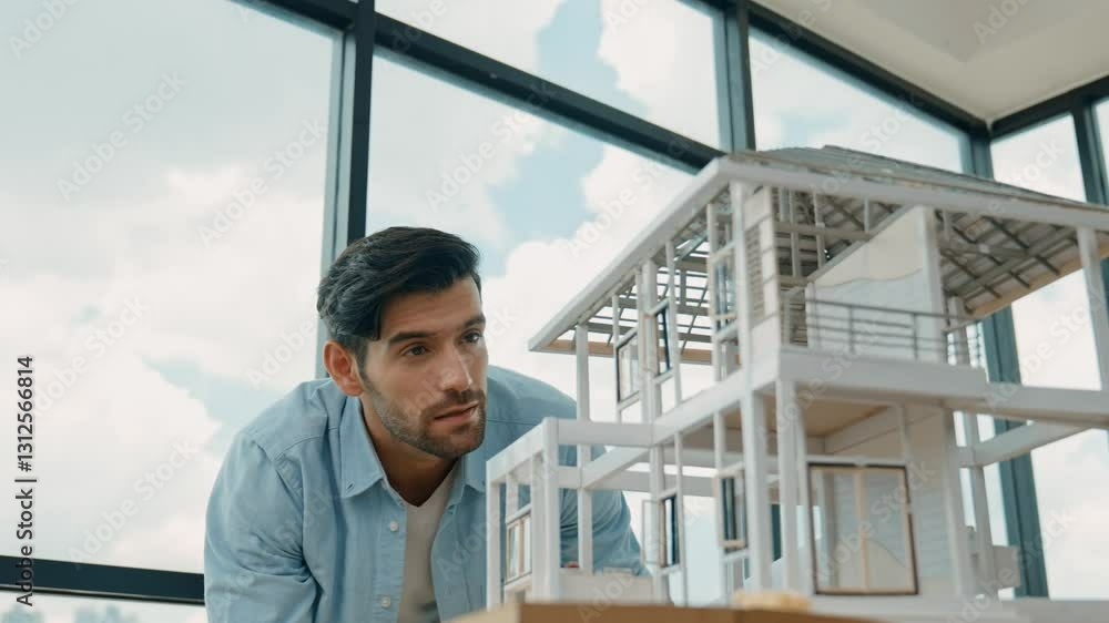 Poster professional smart engineer in casual outfit standing while looking at house model. smart project ma