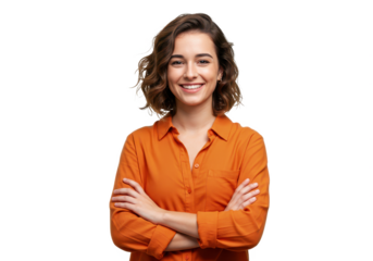 A young woman with short wavy brown hair wearing an orange shirt isolated stands with her arms crossed on transparent background