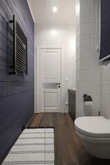 Toilet bowl in the bathroom interior