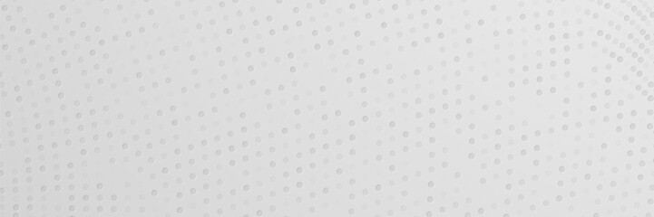 Gray textured surface with circular indentations, background subtle, design element