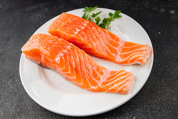 Salmon red fish organic seafood tasty fresh delicious gourmet food background on table rustic food top view copy space keto and paleo diet vegetarian food pescetarian diet