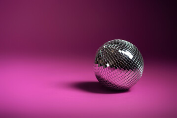 disco ball on pink background
