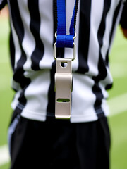 Sports whistle used for refereeing and coaching during games, sports, whistle, referee, coach, game, equipment, metal, tool