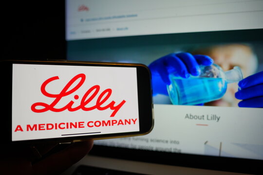 Roosendaal, The Netherlands - March 6, 2025: A mobile phone displaying the logo of Eli Lilly and Company, with the company website in the background.