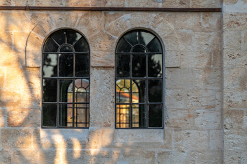 Arched windows of the old Waldheim Church built by in the Templar style by Germans in Alonei Abba in Israel.
