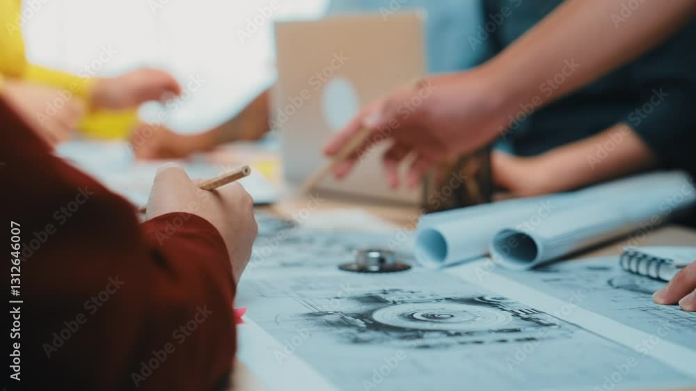 Poster close-up of hands engaged in a collaborative session over blueprints and digital devices in a modern