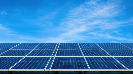 Vast Solar Farm with Solar Panels Under a Clear Blue Sky in a Modern Energy Landscape