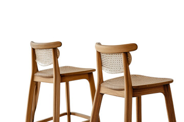 Elegant wooden bar stools with woven seats in a minimalist style against a clean backdrop
