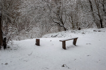 snow covered bench
