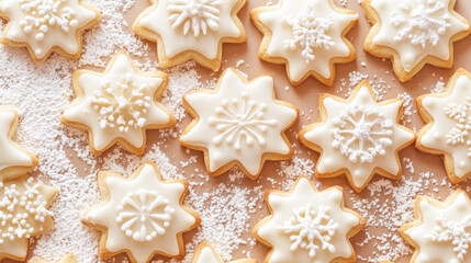 Star-shaped iced cookies with snowflake designs and powdered sugar dusting
