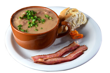 Delicious dish of Brazilian cuisine called Caldo de Feijão. Made with black beans, bacon and sausage. Bean broth. feijoada