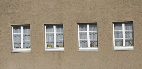 window on a brick wall,
monotonous everyday life