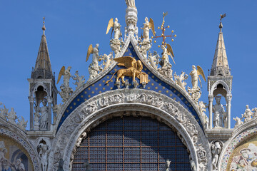 St Mark's Basilica (Basilica di San Marco), ornamental facade, Venice, Italy.