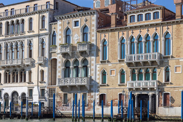 Grand Canal, historic decorative tenement houses by the water, Venice, Italy