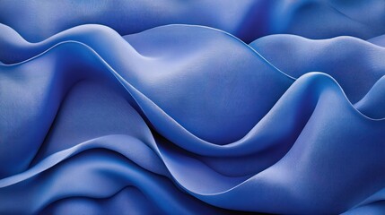 Obraz premium Blue fabric waves, abstract background, flowing texture, design element