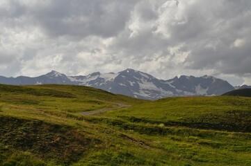 Fototapeta premium landscape with mountains and clouds, tour of the Ecrins and Oisans Massif, hiking, trek, GR54, Alps, France