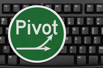 Pivot this way sign on a computer keyboard