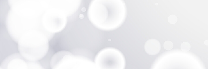 White bokeh background, light circles, soft focus, subtle gradient, website design