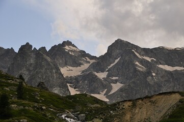 mountain landscape with clouds, tour of the Ecrins and Oisans Massif, hiking, trek, GR54, Alps, France, summer, holidays.