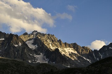 mountains peaks in the alps and clouds,  tour of the Ecrins and Oisans Massif, hiking, trek, GR54, Alps, France, summer, holidays.