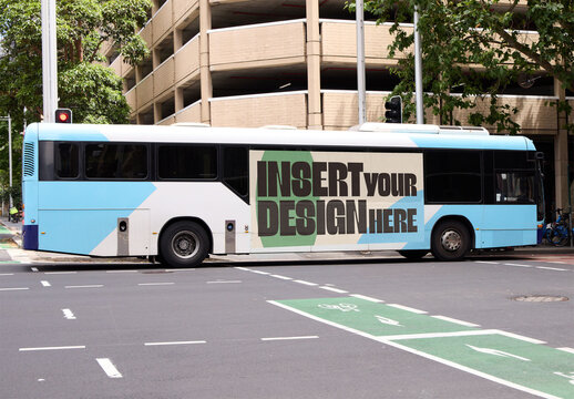 Public Transport Bus Navigating Through the Urban Streets of Sydney During the Day
