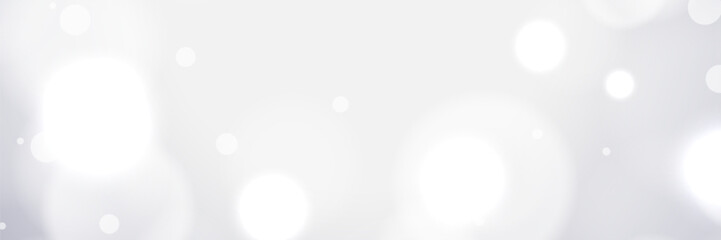 White bokeh lights background, soft glow, abstract design, website banner