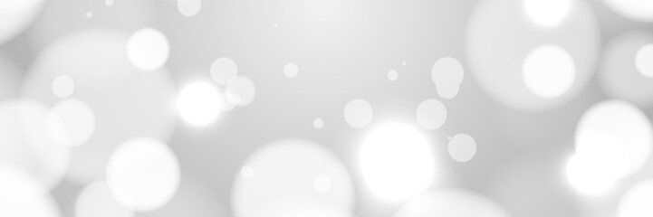 White bokeh lights blur background, abstract design, website banner