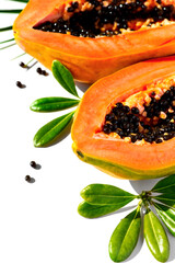 Papaya fruit isolated on white background, fresh exotic fruits with leaves and seeds border design. Halved fresh organic sweet Papaya exotic fruit art design, close up. Top view, vertical image