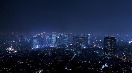 Fototapeta premium Stunning cityscape with glowing skyscrapers at night.