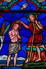 Fototapeta premium 2025-01-26, Église Saint Marc - Orléans, FRANCE. Stained glass (19th century) of Baptism of Jesus by John the Baptist in the Jordan river. .