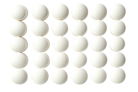 White spherical objects arranged in a grid pattern on a plain background