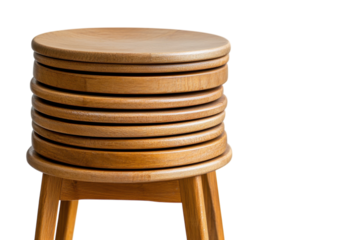 Stacked wooden stools arranged in a neat and orderly manner in a bright setting