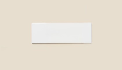 Minimalist blank white rectangular sign mounted on a beige wall for customization