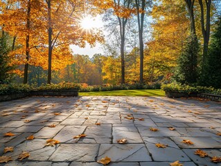 Sunlit autumn leaves on stone patio, vibrant fall foliage backdrop.