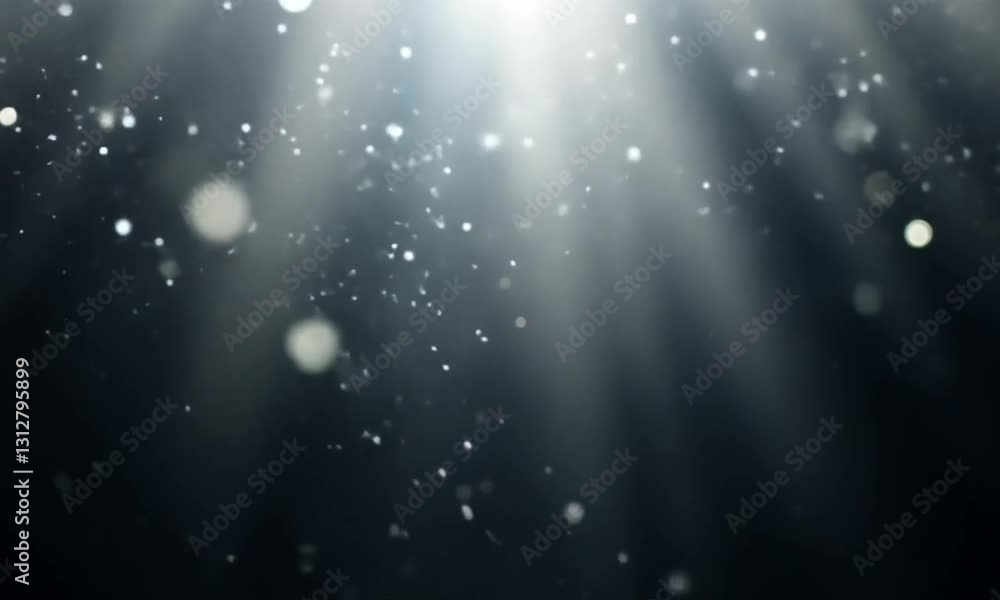 Poster glowing particles floating in dark background with light rays.
