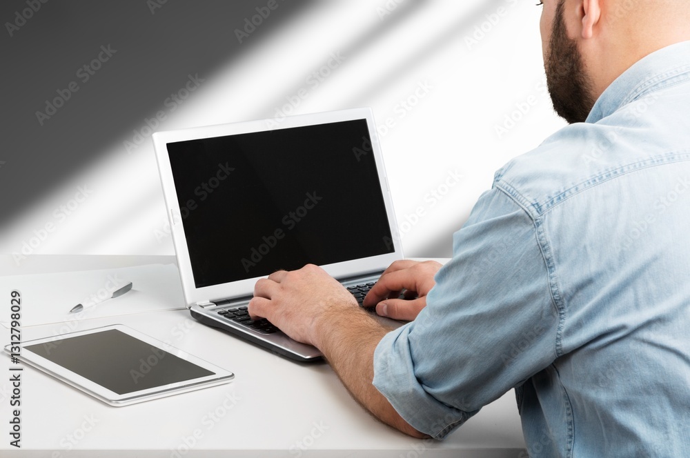 Poster man searching in internet browser on computer