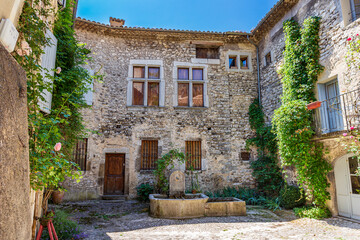 Concorde  square in Châtillon en Diois, Drôme department, southeastern France. Medieval square, street and houses in the center of the village.
