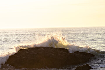 waves breaking on the beach