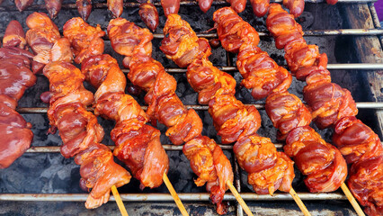 close up grilled chicken with charcoal