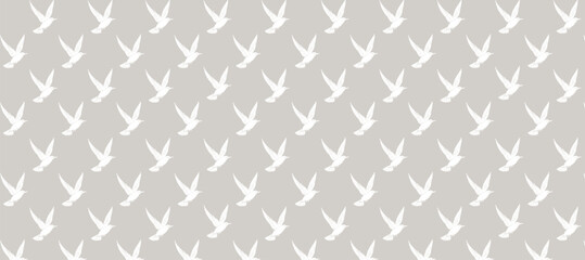 Grey pattern with white silhouette of birds flight background