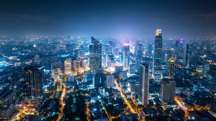 Fototapeta premium Vibrant cityscape dazzling with nighttime lights view.