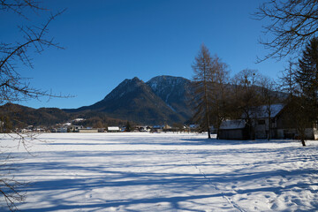 Beautiful Austrian Winter Landscape with Field, Mountains and Pathway. Bad Goisern, Upper Austria.