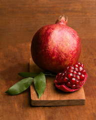 fresh pomegranate on wooden background