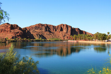 Mountain View in California across the Parker Strip of the Colorado River between Parker Dan and Headgate Dam in Buckskin Mountain State Park in Parker, Arizona, USA with blue sky copy space. 