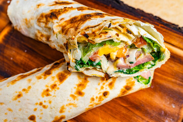 Delicious wrap filled with fresh vegetables and savory ingredients