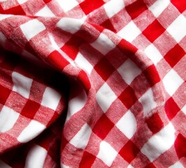 Obraz premium The table cloth is isolated in the kitchen, with a red napkin on a white background, shown from a top view